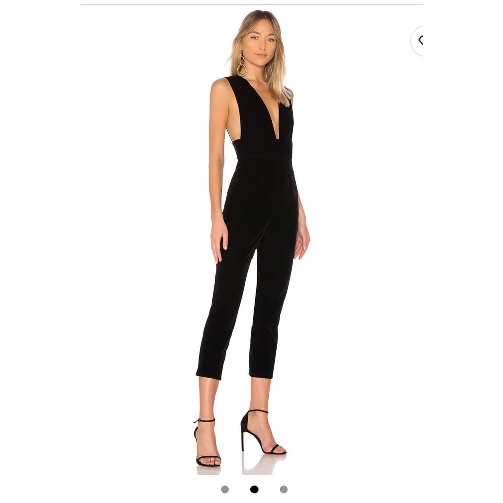 By the way. Gloria V deep neck velvet jumpsuit